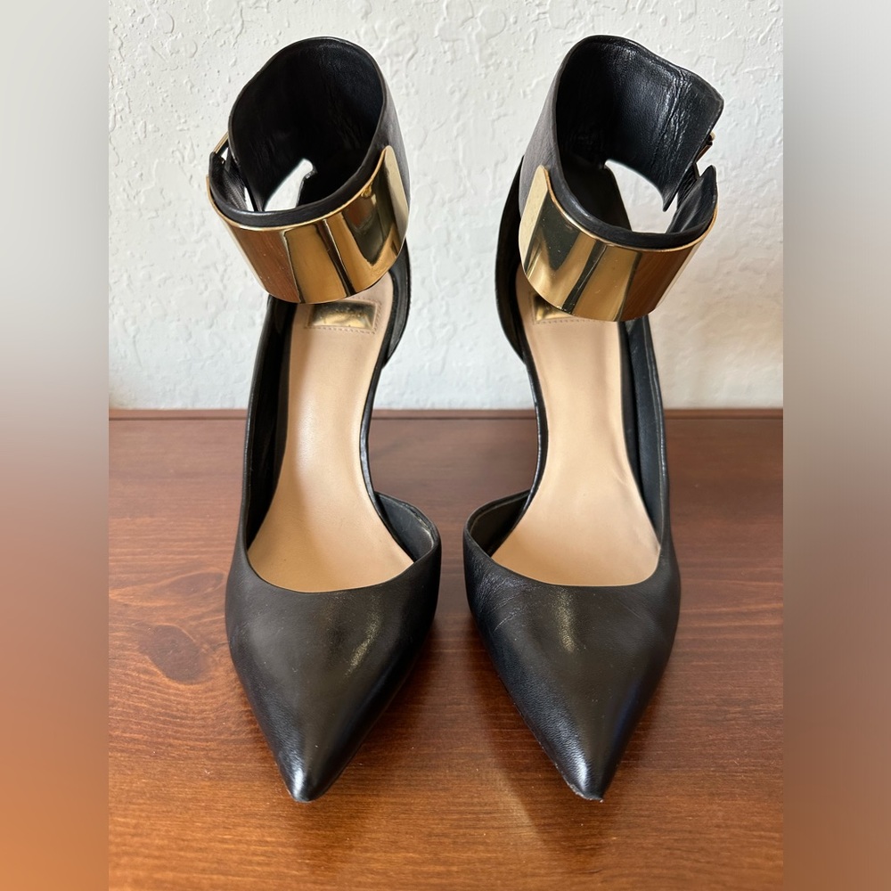 MARCIANO Sleek Black and Gold Gold Leather Pointed Toe Heels